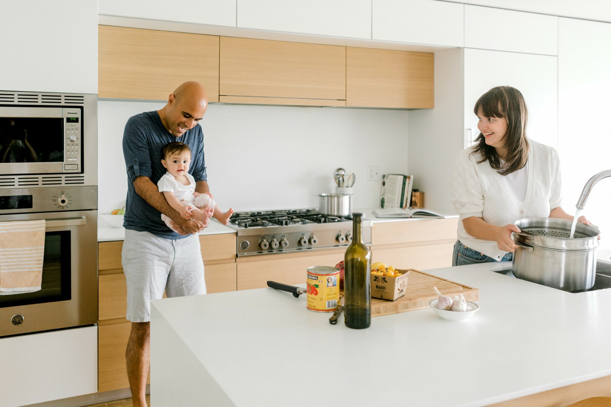 family cooking in modern kitchen
