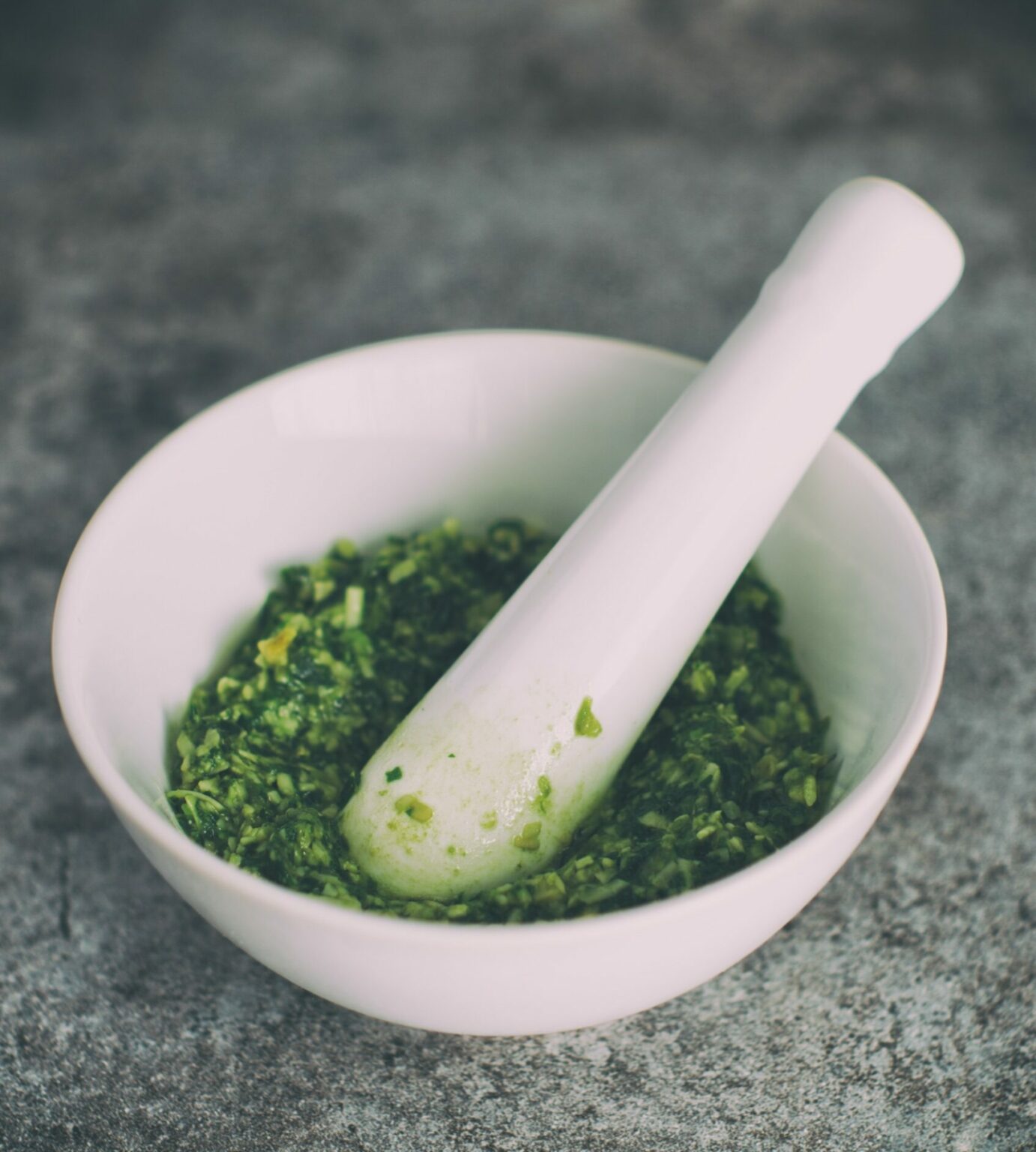 Making homemade pesto mortar and pestle