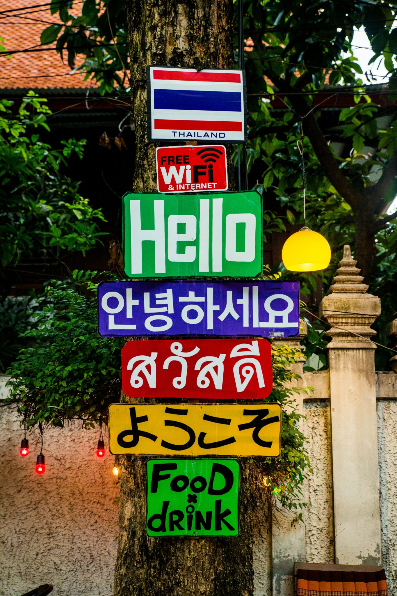 Thailand sign in multiple languages food and drinks colourful