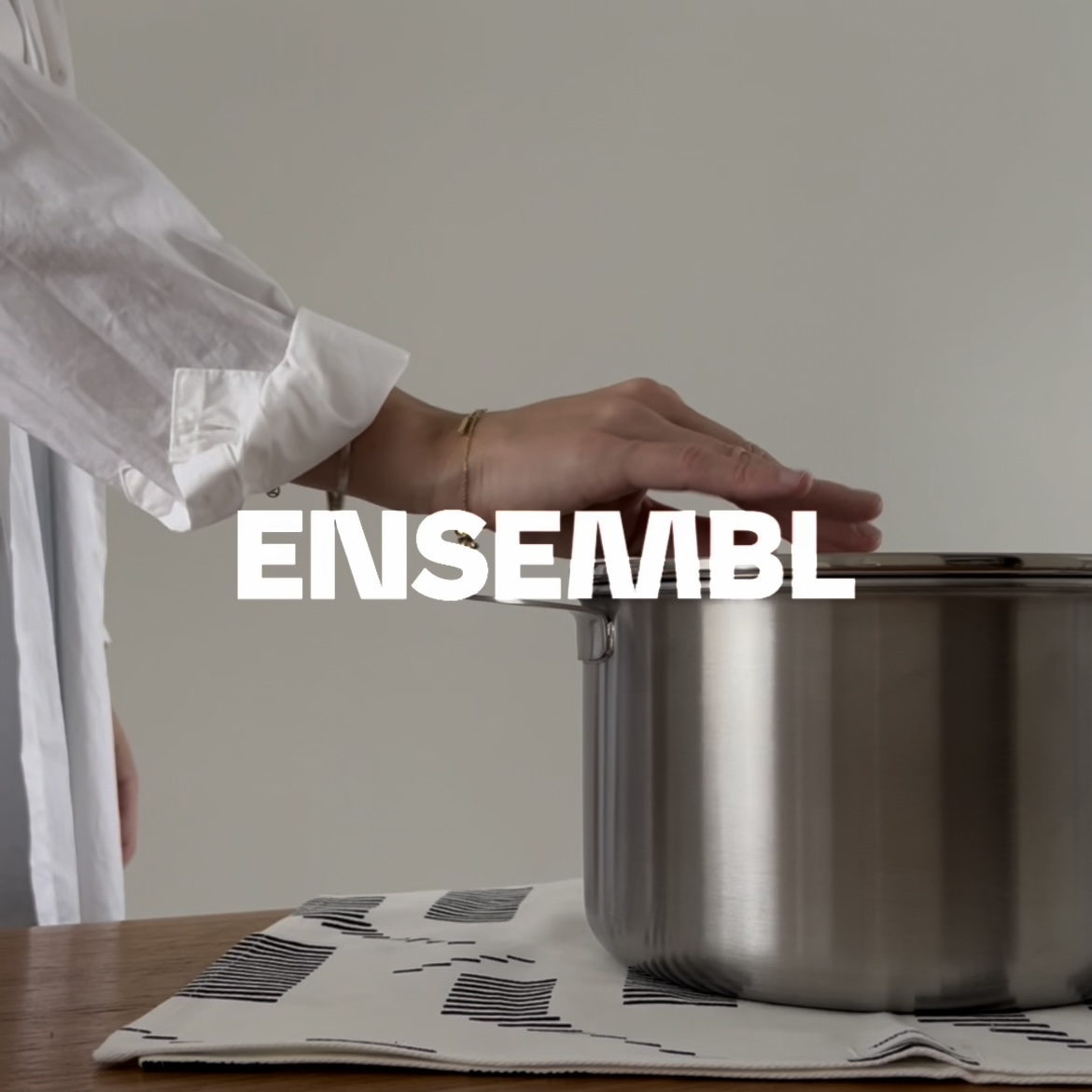 LEARN MORE about ENSEMBL Stainless Steel Fully Clad Stacking Cookware Set with removable handles. Learn how to easily clean and care for Stackware's flat-lying lid with this step by step video and guide to cleaning. Frying Pan, Braiser Pan, Small Saucepan, Medium Saucepan, Stockpot, Steamer/Colander. Multifunctional, long-lasting, design-forward home wares. Oven-safe cookware set. Induction-safe cookware set.