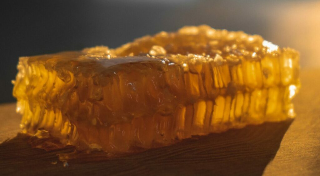 Golden honeycomb on table