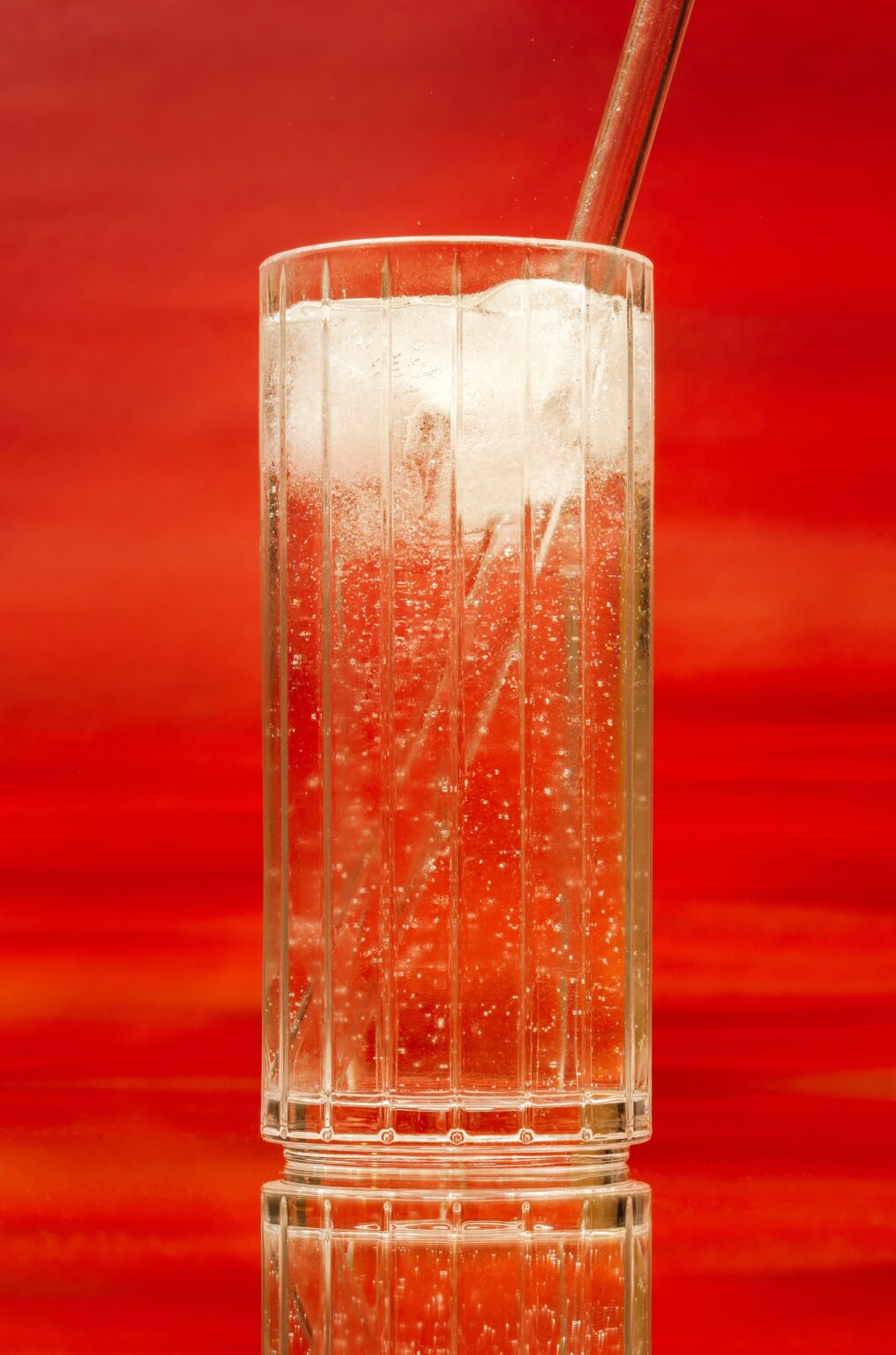 Iced drink on red background