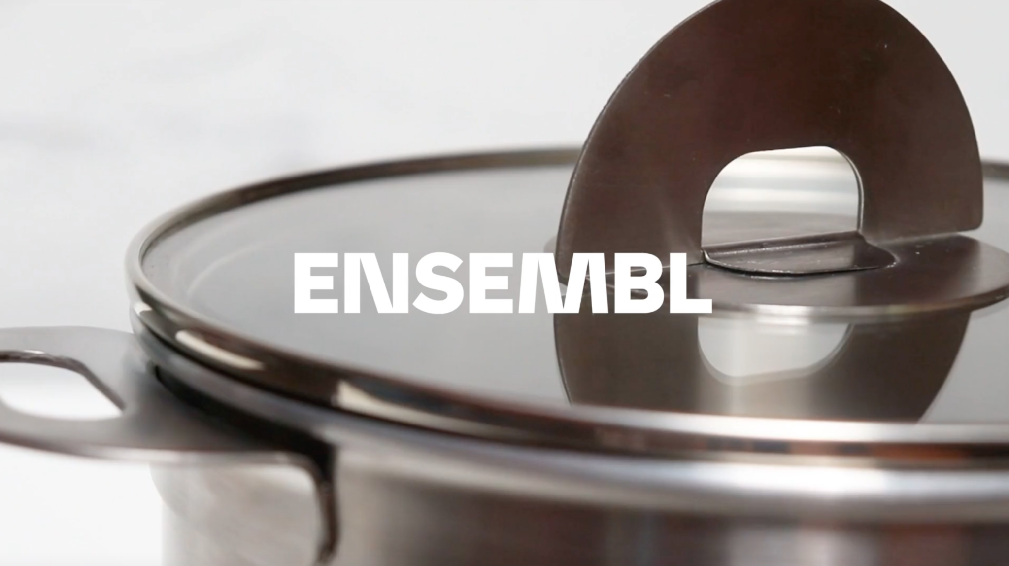 ENSEMBL logo over stainless steel cookware