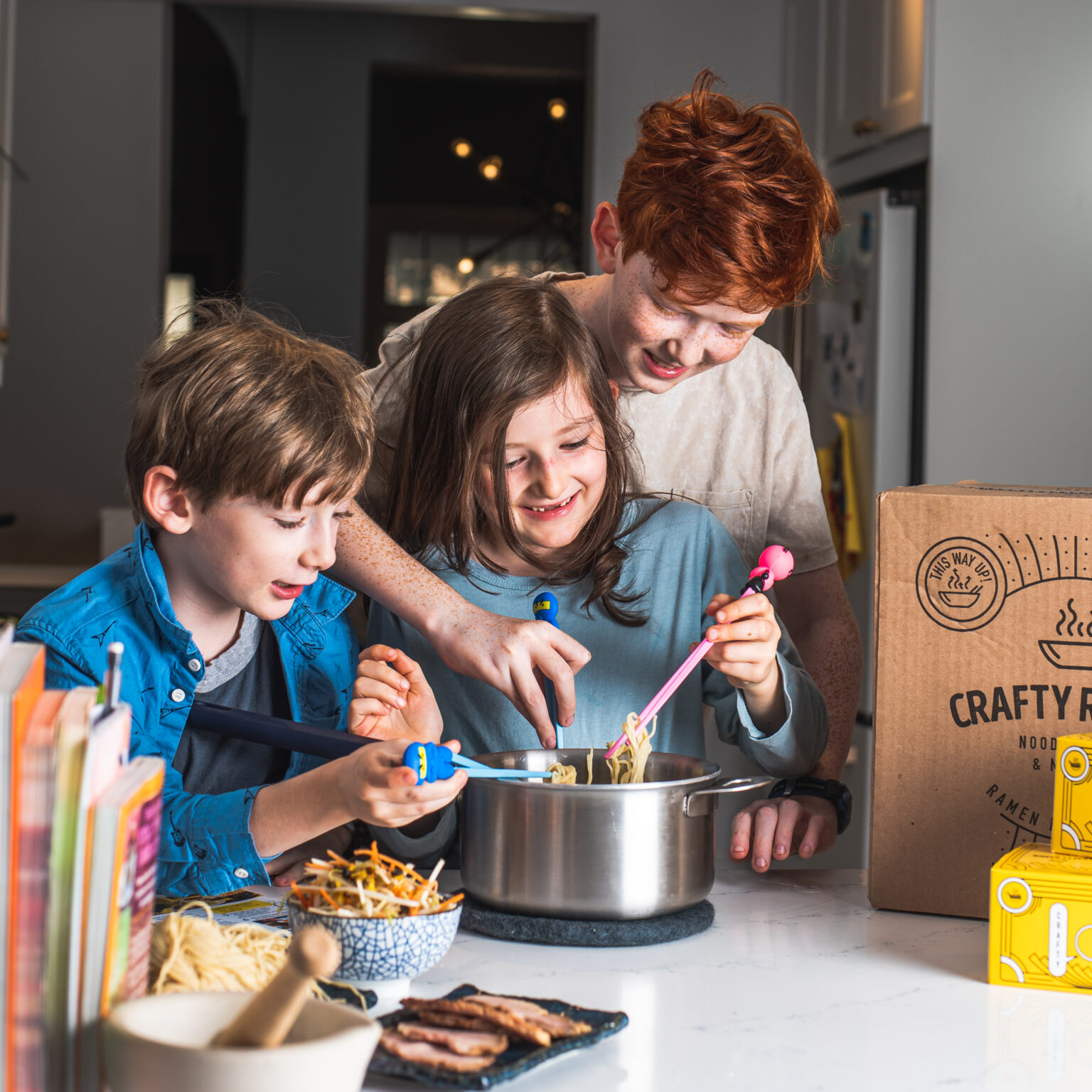 Children cooking crafty ramen in ENSEMBL Stackware